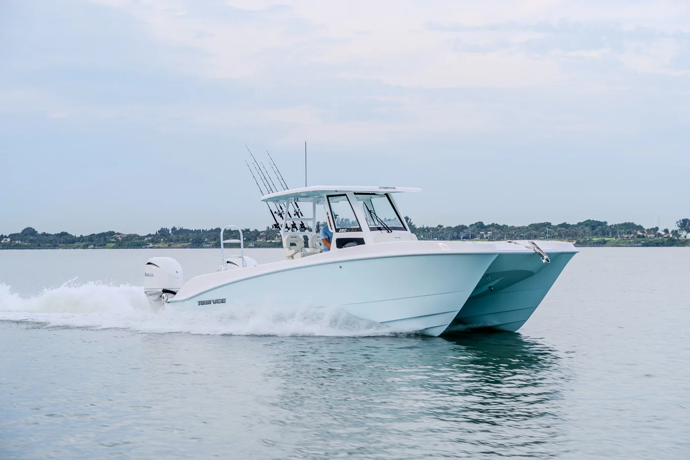 Twin Vee power catamaran running at speed on the water