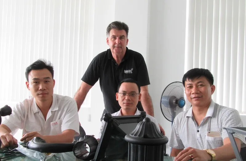 David Morgan with business partners in Vietnam